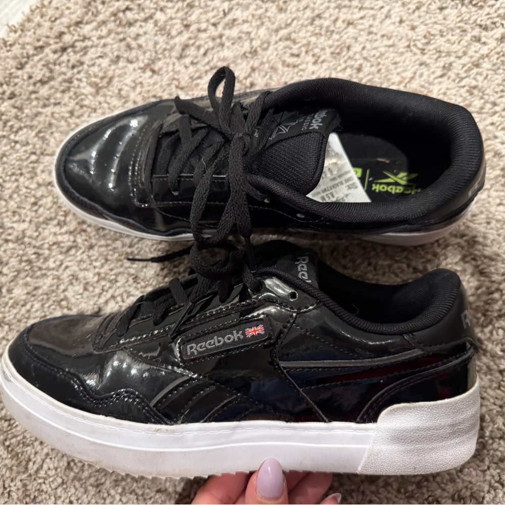 Shiny black Reeboks